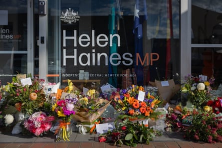 Flowers and messages of support pile up outside Helen Haines MP’s office