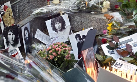 Tributes adorn the grave of Doors frontman Jim Morrison at the Père Lachaise cemetery in Paris