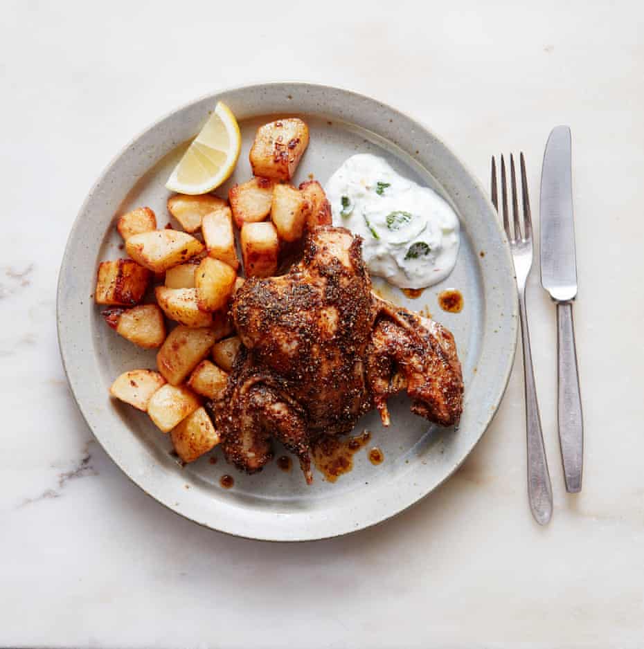 Thomasina Miers' spatchcock game bird grilled with Rajasthani spices with roast potatoes and raita.