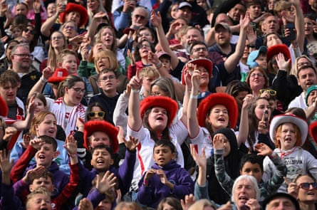 Supporters at Twickenham watch England beat Ireland