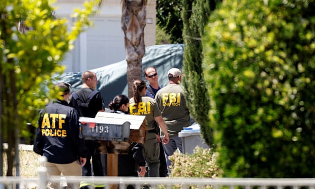 ATF and FBI agents approach the scene of the Santa Clara Valley Transportation Authority mass shooting suspect’s house.