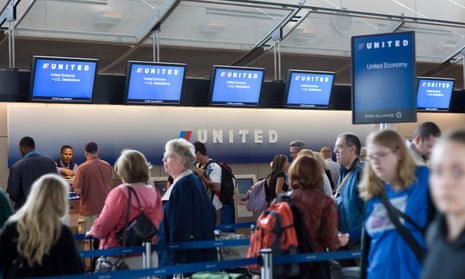 Passengers wait to check-in at a United Airlines ticket coun<br>UNITED STATES - JUNE 04:  Passengers wait to check-in at a United Airlines ticket counter at the Denver International Airport in Denver, Colorado, U.S., on Wednesday, June 4, 2008. UAL Corp.'s United Airlines, the world's second-largest carrier, will shut its low-fare Ted airline, ground 70 planes and cut as many as 1,100 jobs as surging fuel prices extend an industrywide contraction.  (Photo by Matthew Staver/Bloomberg via Getty Images)