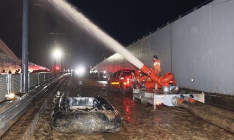 Search operation in flood-hit underground tunnelepa10750614 Rescue workers pump water out of a flooded underground tunnel in the town of Osong, North Chungcheong Province, central South Korea, on 17 July 2023, as they search for missing people who are believed to have been submerged inside the tunnel after a nearby river overflowed due to heavy rain on 15 July. EPA/YONHAP SOUTH KOREA OUT