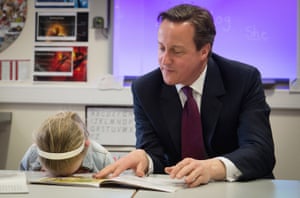 David Cameron reads to six-year-old Lucy Howarth