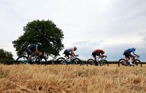 Groupama - FDJ United's Ewen Costiou, Lotto Intermarche's Baptiste Veistroffer, TotalEnergies's Matteo Vercher and Bahrain Victorious's Damiano Caruso in action at the front of the race