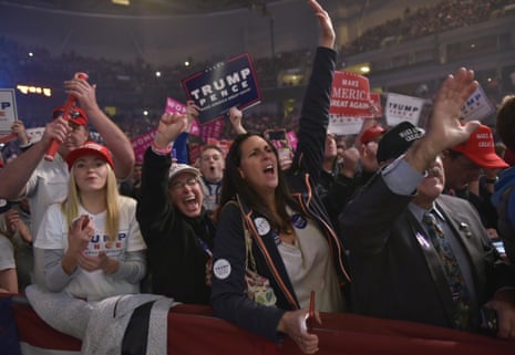 Supporters cheer as Republican presidential nominee Donald Trump addresses the final rally of his 2016 presidential campaign at Devos Place in Grand Rapids, Michigan on November 7, 2016.