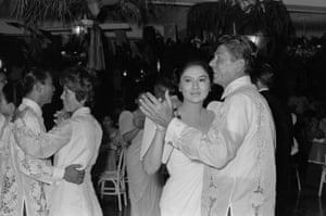 Ronald Reagan dances with Imelda Marcos, while President Marcos dances with Nancy Reagan, during a state visit to Manila in 1969.