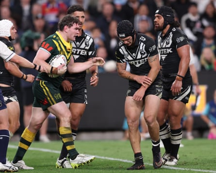 Kalyn Ponga holds his arm during the 2026 men’s Rugby League World Cup match between Australia and New Zealand at Allianz Stadium
