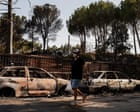 ‘The breath just went out of us’: people return to their homes after wildfires near Madrid