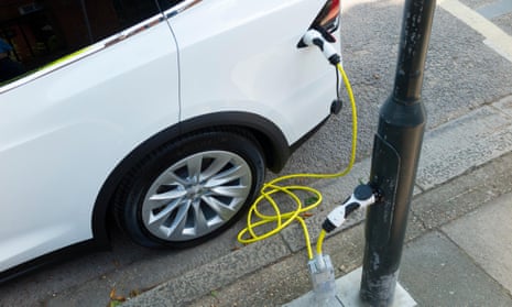 Electric car being charged