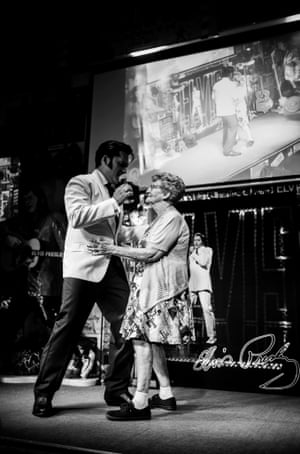 People category winner  ‘Starring as Elvis’ shows an Elvis impersonator dancing with an elderly woman