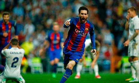 Lionel Messi celebrates scoring Barcelona’s winner, his second goal of the night, in added time at Real Madrid.