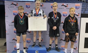 Heaven Fitch stands top of the podium after her victory