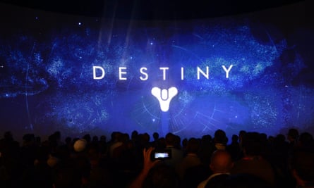 Attendees watch a presentation by Activision on its game ‘Destiny’ on the second day of the E3 (Electronic Entertainment Expo) in Los Angeles.