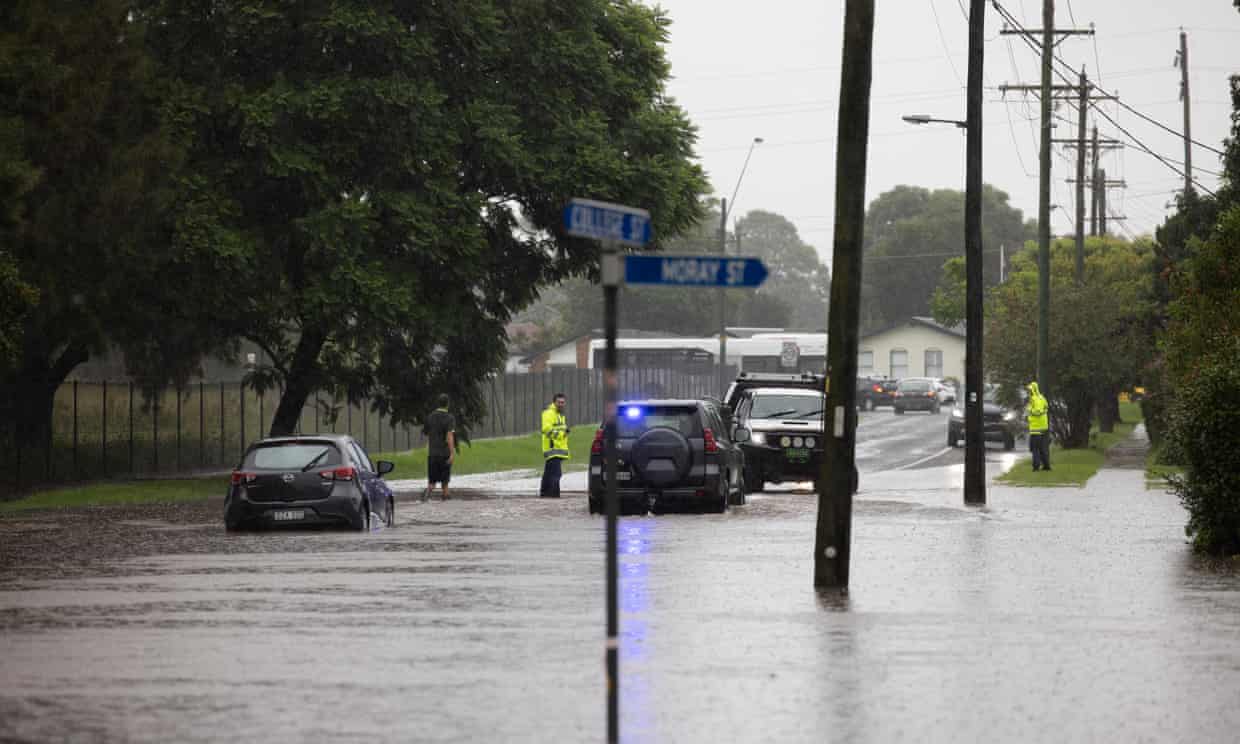 Sydney and Illawarra dodge east coast flooding after 500,000 people faced evacuation across state as climate disasters intensify (theguardian.com)