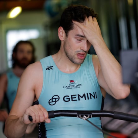 Kenny Coplan, a member of the men’s blue boat crew, looks exhausted during a long session on an ergo machine at the Goldie boathouse in Cambridge.