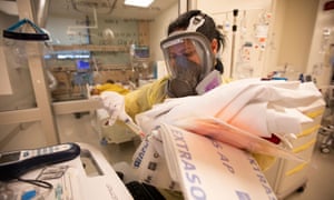 Nurse Michelle Goldson works inside the ICU at Martin Luther King Jr community hospital on Thursday in Los Angeles.