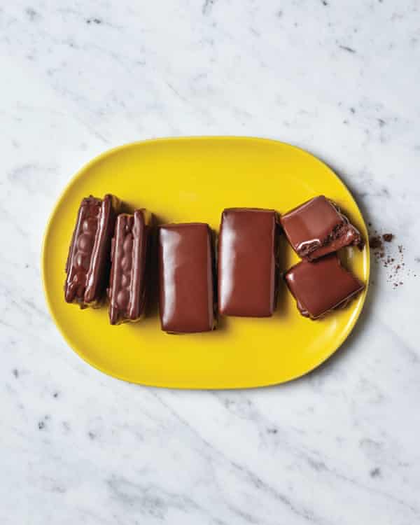Homemade Tim Tams on a yellow plate