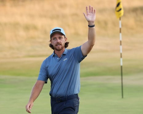 Tommy Fleetwood acknowledges fans on the 18th green.