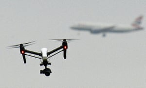A drone flying in Hanworth Park in west London as a British Airways 747 plane prepares to land at Heathrow airport.