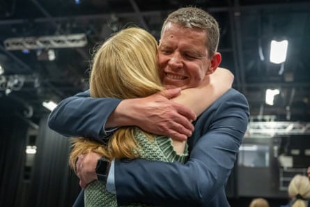 Rhun ap Iorwerth hugs his wife, Llinos, in Llandudno, Wales.