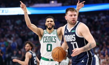 Jayson Tatum and Luka Dončić react after a call during Game 3 of the NBA finals