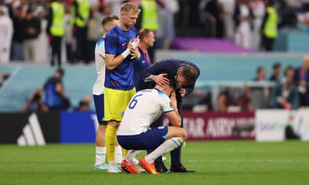 Gareth Southgate consoles Harry Maguire after the quarter-final defeat by France.
