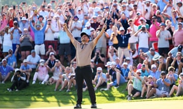 Xander Schauffele looks to the skies as the spectators roar with delight after the American sinks his birdie putt at 18 to win the US PGA Championship by a shot. 