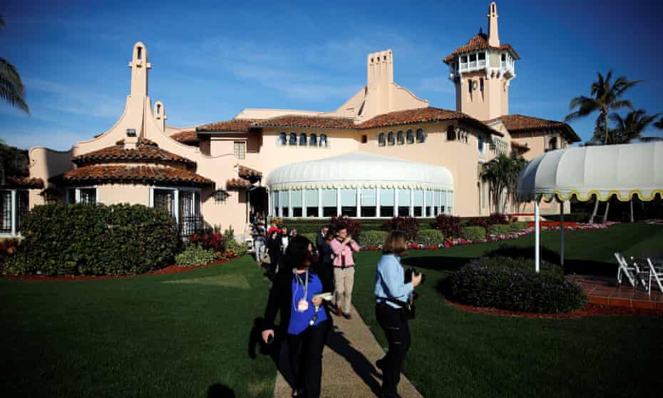 Members of the media are seen at the Mar-a-Lago estate.