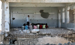 A damaged school in Yemen’s third-city of Taez