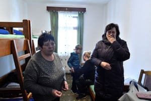 Ukrainian refugees Svetlana, 75, Raisa, 72, and Maksim, 6, with his mother Anna, in their room at Putna Monastery, after fleeing Ukraine amid Russia’s invasion of the country, in Putna