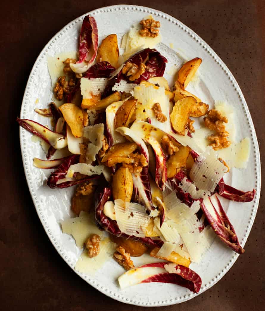 An autumn salad of crisp leaves, apples, pecorino and walnuts.