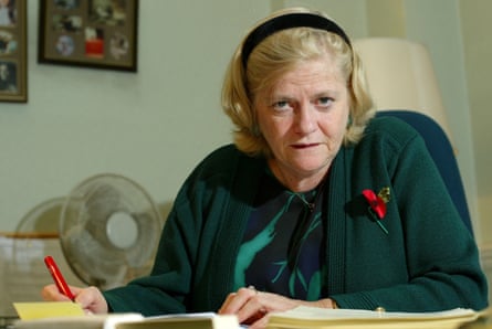 Ann Widdecombe sitting at a desk