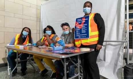 A vaccination site at the 34th St subway station in Manhattan. The new incentive, called the “Vax &amp; Scratch”, will allow those who get vaccinated to receive a $20 lottery ticket for the $5m Mega Multiplier Lottery.