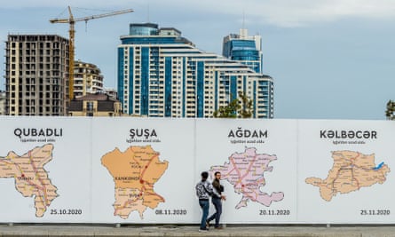 A poster in the Azerbaijani capital of Baku showing maps of the towns of Nagorno-Karabakh