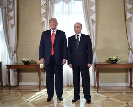 US President Donald Trump (L) and Russia's President Vladimir Putin pose ahead a meeting in Helsinki in 2018.