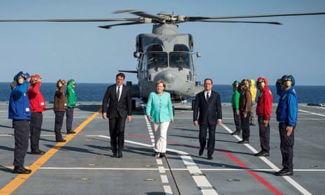 Matteo Renzi (left) François Hollande (right) and Angela Merkel arriving for their meeting in Ventotene.