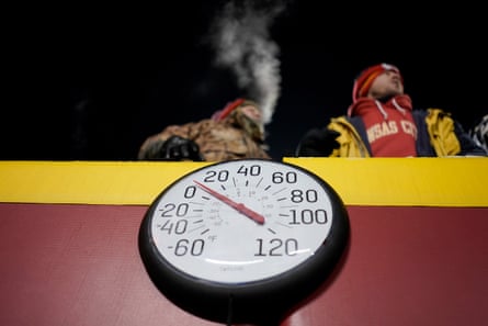 A gauge displays the temperature on the field at Arrowhead Stadium during the first half of the AFC wildcard playoff football game between the Kansas City Chiefs and the Miami Dolphins on 13 January.