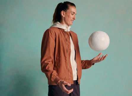 Jill Scott puts on her unbranded soccer ball.