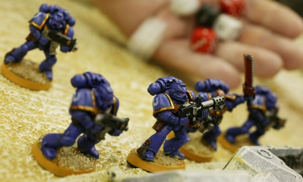 A customer plays a game of Warhammer in a Games Workshop store in London.