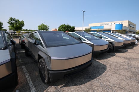 Unsold Tesla vehicles sit in a parking lot at the Hunter Square Mall on 2 June, 2025 in Farmington Hills, Michigan.