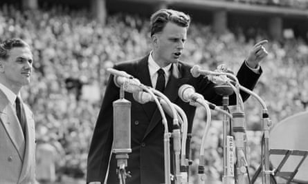 Billy Graham speaks to over 100,000 Berliners at the Olympic Stadium in Berlin, Germany, June 1954.