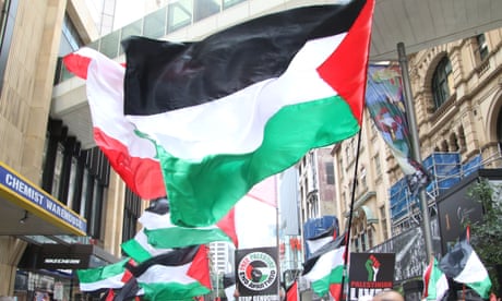 Flags in support of Palestine in Sydney on Sunday
