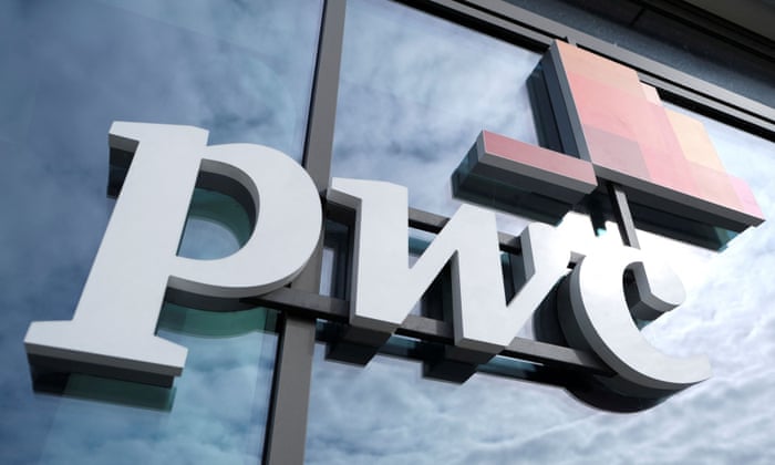 The logo of Price Waterhouse Coopers is seen at its Berlin office.