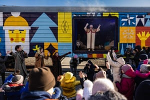 A man dressed as Saint Mykola (Saint Nicolas) performs for children at Kramatorsk train station in eastern Ukraine