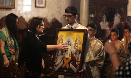 Palestinian Christians attend an Orthodox Easter service in Gaza