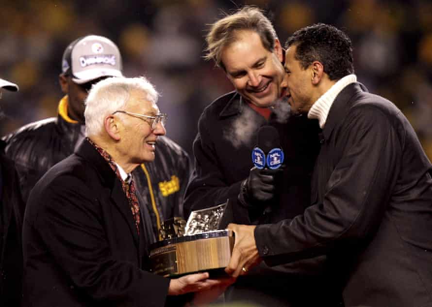 The late Pittsburgh Steelers owner Dan Rooney revciving a trophy in 2009. While the NFL’s divesrity and inclusion chairman, Rooney introduced measures to address the lack of black managers in American football.