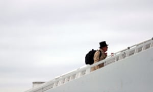 ITV presenter Brough Scott sporting a top hat as he arrives at Epsom.