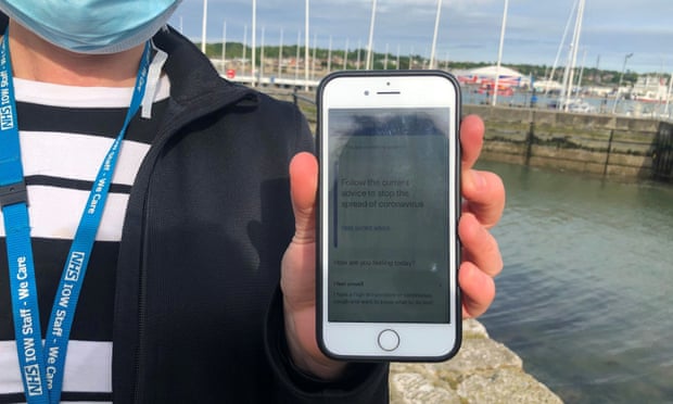 An NHS employee on the Isle of Wight uses the contact-tracing app.
