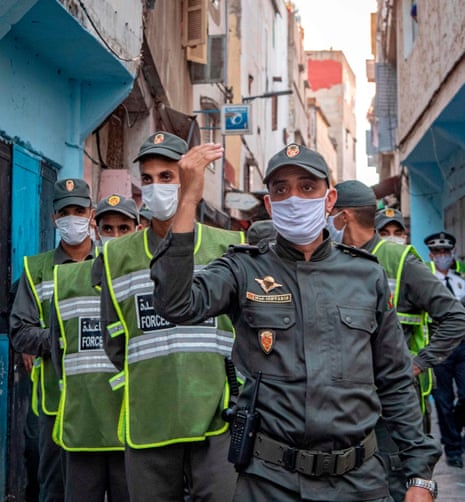 Members of Morocco’s interior ministry forces patrol a neighbourhood in Rabat